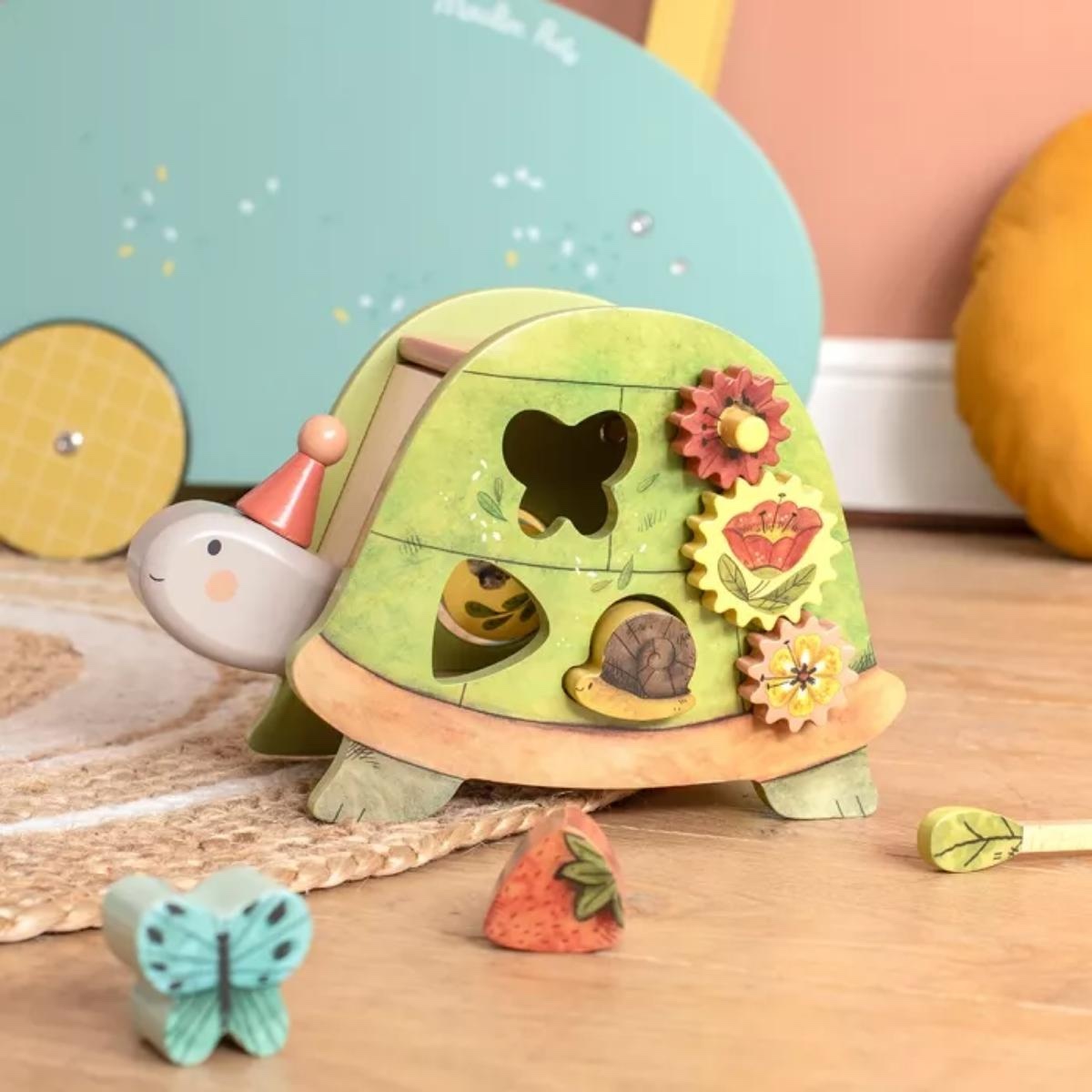 Activity-Schildkröte DREI KLEINE KANINCHEN Moulin Roty 