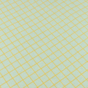 Babybettlaken aus Bio-Baumwolljersey STORIES Limitierte Auflage 70x140cm Nobodinoz grün Zitrone Gitter