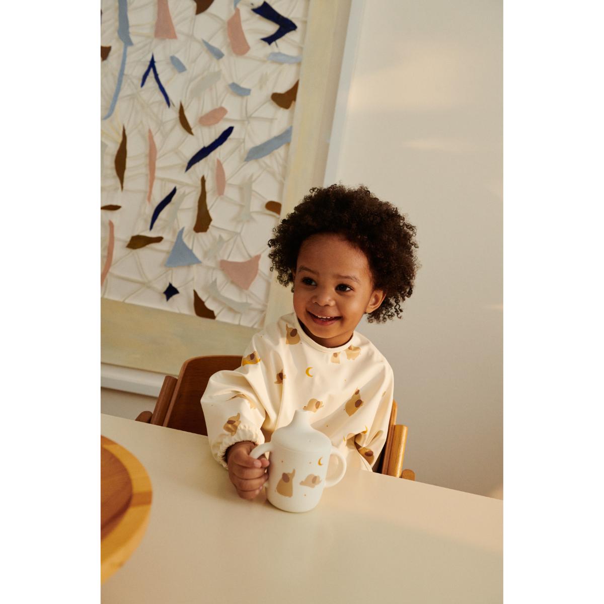 Bavoir manches longues MERLE Liewood Elephant creme de la creme