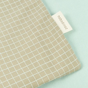 Extraweiche Decke für Neugeborene STORIES Limitierte Auflage 70x100cm Nobodinoz green grid