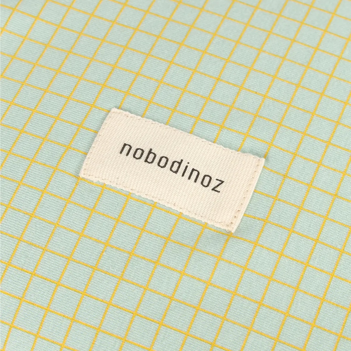 Matrizenhaus STORIES Limitierte Auflage - Bio-Baumwolljersey 50x70cm Nobodinoz grünes Zitronengitter