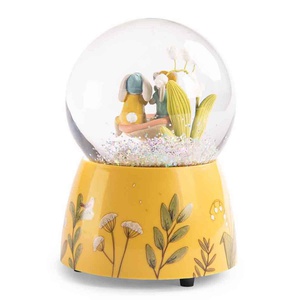 Musikalische Schneekugel TROIS PETITS LAPINS Moulin Roty