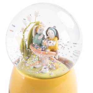 Musikalische Schneekugel TROIS PETITS LAPINS Moulin Roty