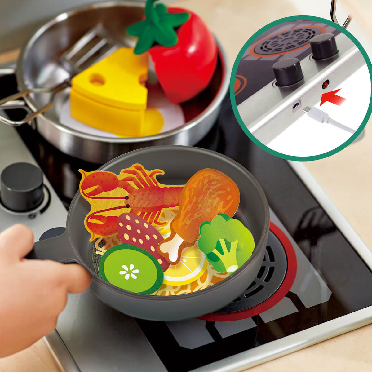 Spielküche Deluxe mit Mikrowelle Hape