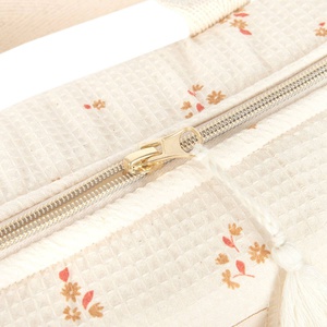 Wasserdichte Wickeltasche GALA 35x27x14cm Nobodinoz Yellow Lily