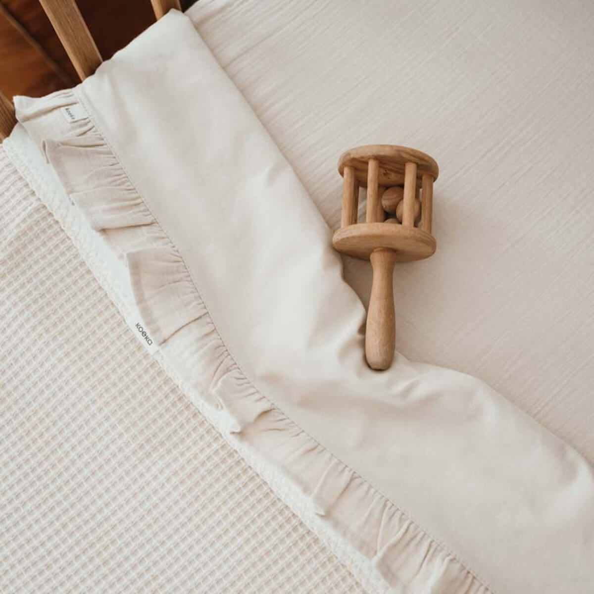 Wiegendecke aus Baumwoll-Fleece Malaga Koeka warm white